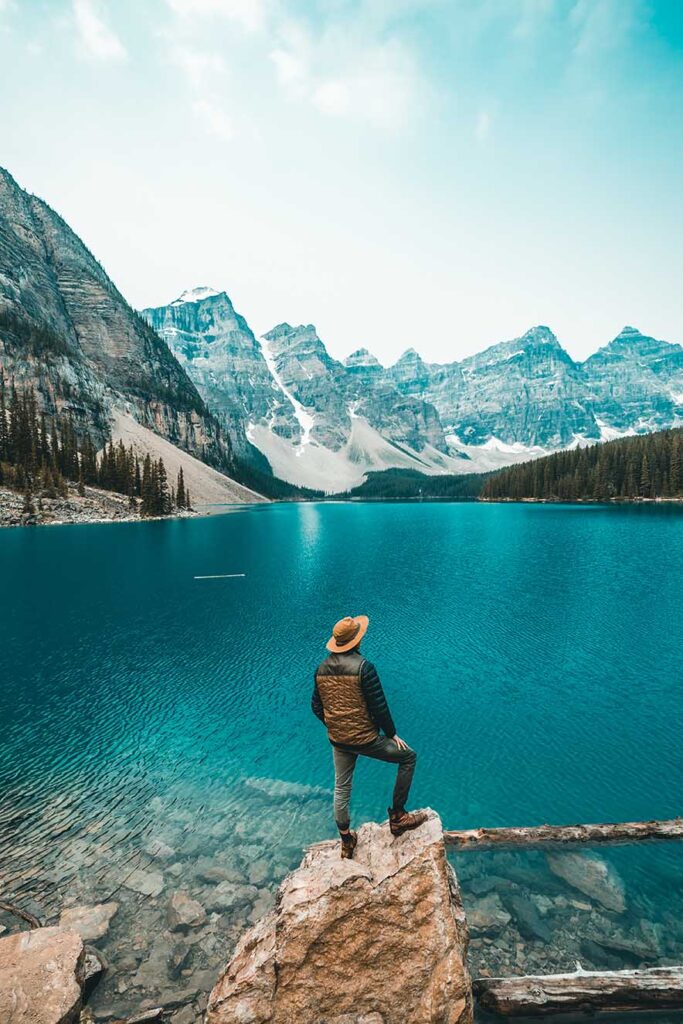 man-standing-rock-near-lake.jpg